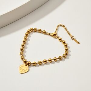 Gold Beaded Bracelet with Heart Charm
